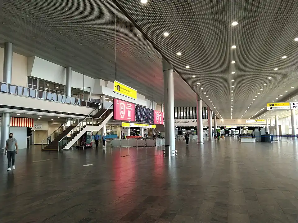 A long, almost empty hall in Terminal F of Moscow Sheremetyevo
